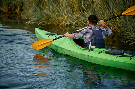 A man enjoying a nice day at the lake