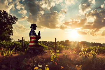 American flag forming a soldier silhouette against vineyards, peaceful Memorial Day backdrop.