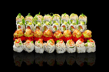 Enticing set of sushi rolls with various fillings and toppings on black - Powered by Adobe