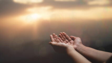 Human hands open palms in worship Belief in God, repentance, prayer, Christian religion concept....