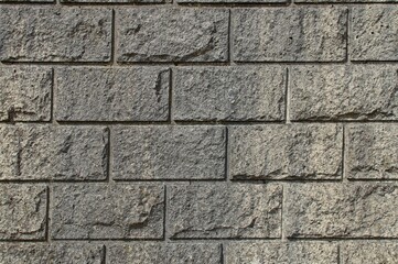 texture of rough grey brick wall