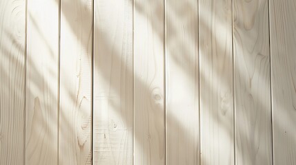 The light casts beautiful blurred shadows of tree leaves on the surface of the beige wooden plank board wall.