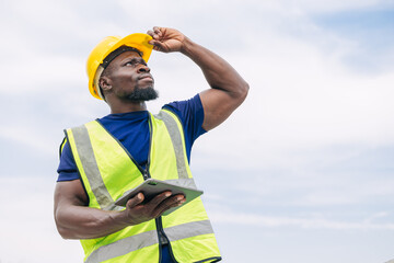 Portrait African black smart engineer worker foreman supervisor standing looking high outdoor