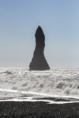 the famous, unique and breathtaking rock formations in the water close to the black sand beach...