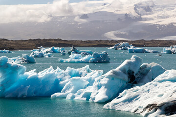 a stunning panoramic view over the unique breathtaking and iconic Jökulsárlón lagoon lake in...