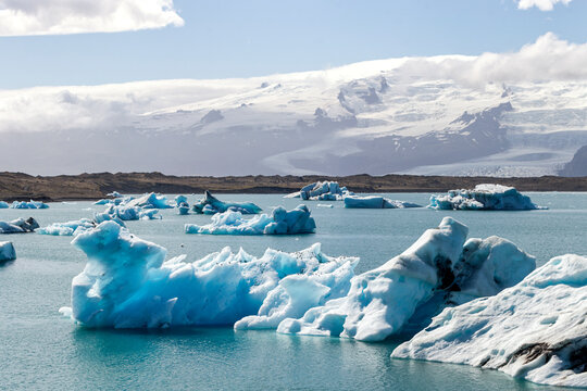 a stunning panoramic view over the unique breathtaking and iconic Jökulsárlón lagoon lake in iceland. With big icebergs on the water. 