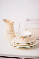 Closeup of porcelain plates and bowls