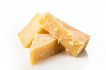 a pile of cheese sitting on top of a white surface