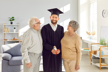 Man graduate hugging old parents smiling together family love ending of university education....