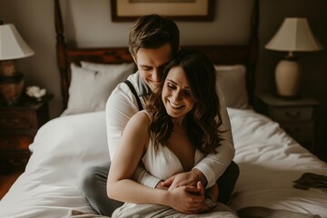 Couple hugging on bed in daylight