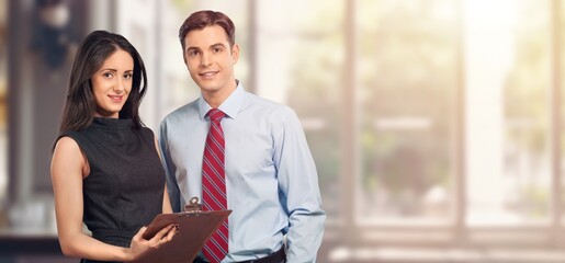 businessman and businesswoman couple discussing project in office.