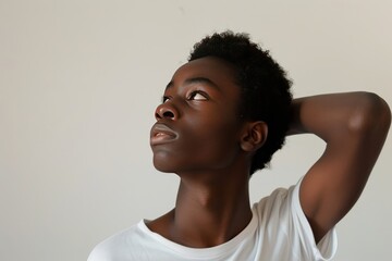 Obraz premium Young Black Boy on White Background