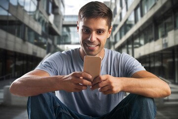 Upset businessman read message on smartphone on the city street