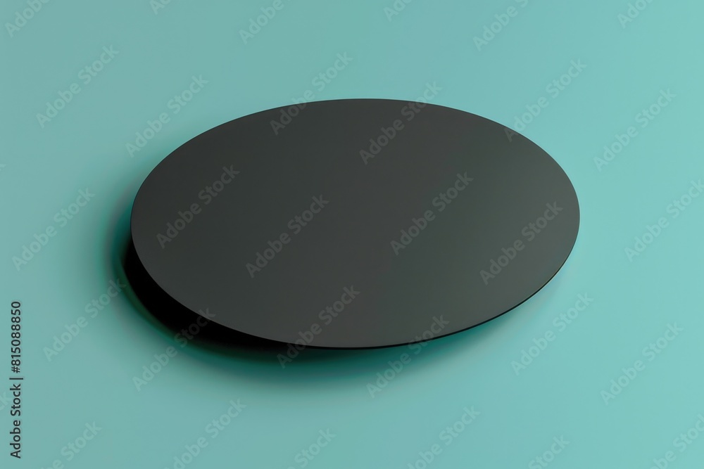 Aufkleber a black circular object on a blue background, suitable for various design projects