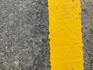 yellow asphalt texture. yellow line on asphalt
