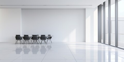 A spacious conference room with a large window, white walls, and a table with black chairs