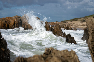waves crashing on rocks