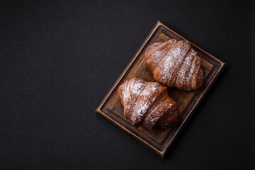Delicious fresh sweet crispy croissant with chocolate