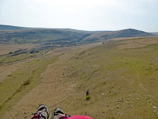 Fototapeta premium Paragliding above the Hills of Dartmoor in Devon
