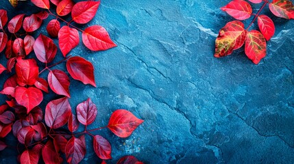 Autumn background with colored red leaves on blue slate background, a celebration of the season’s change, where every leaf is a burst of color.