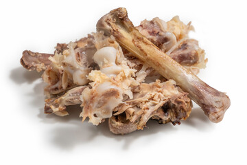 Food scraps. Chicken bones on white background.