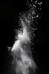 white particles like spray-smoke on black background, vertical photo, special product backgrounds, like explosion