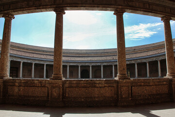 The Circular Patio of the Palace of Charles V is a testimony to the harmonious fusion of...