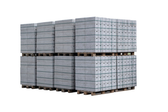 Concrete Cinder Blocks in Industrial Pallets, Grey brick Shapes building material. New for use on construction site or store in europe. PNG Transparent bg. isolate - Powered by Adobe