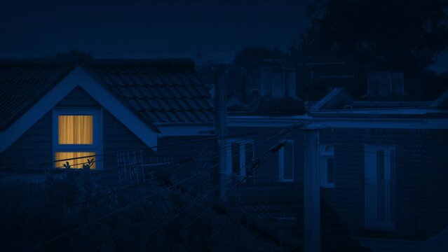 Light On Or Off In House At Night In Suburbs
