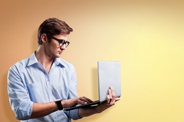 Photo of positive cheerful person hold laptop