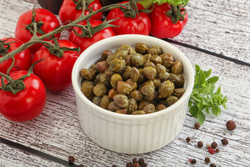 Marinated green capers in the bowl