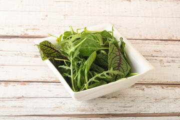 Green mix salad in the bowl