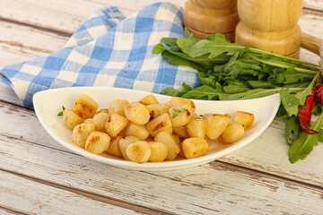 Roasted delicous scallop in the bowl
