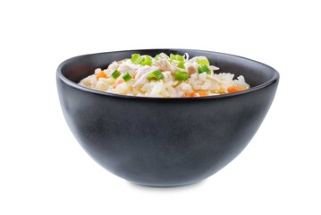 Asian rice chicken soup with carrots and celery in a bowl on a white isolated background