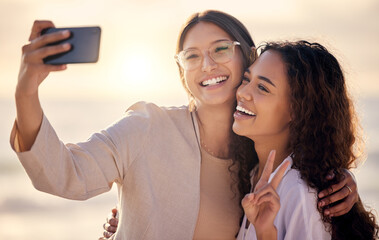 Lesbian, couple and peace sign in outdoor selfie, travel and capture moment for bonding on date. People, love and emoji in nature on vacation or holiday, romance and lgbt social media update on trip