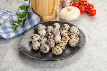 Raw quail eggs in the bowl