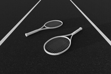 White tennis rackets on black hard tennis court. White lines. Sports equipment.	
