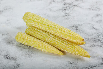 Raw sweet baby corn heap