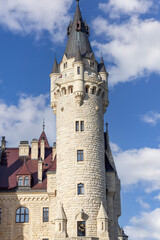 Fototapeta premium Moszna, Opole, Poland - November 12, 2022: 17th century Moszna Castle, historic castle and residence located in small village, one of the best known monuments in Upper Silesia
