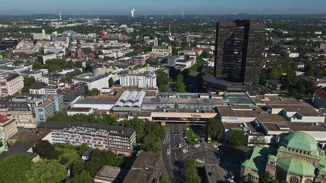 Aerial drone view of Essen City Hall ( Rathaus Essen ) and Theater im Rathaus in Essen , Germany .