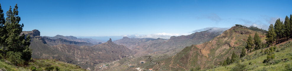 Fototapeta premium Panoramic view from the Degollada de Becerra viewpoint where you can see the Roque Nublo and Teide peak