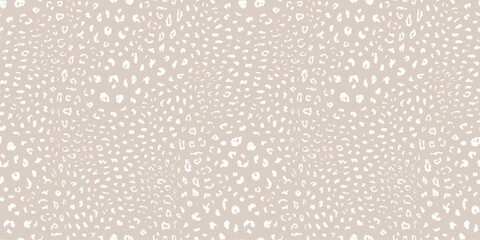 Leopard print pattern. Vector seamless background. Subtle animal skin texture of jaguar, leopard, cheetah, panther, puma, cat fur. White and beige pattern with small spots, dots. Repeated geo design
