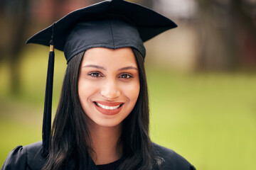 Woman, portrait and happy for college graduation on campus with celebration, success and completion for qualification. Student, university and pride with smile or confident on education or future
