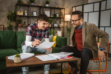 Adult professor mentor have a class with young student at home
