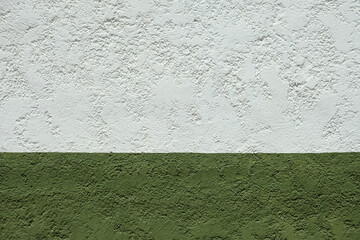 Double colored grunge wall with slightly rough texture, divided in two parts. Wall painted in two...