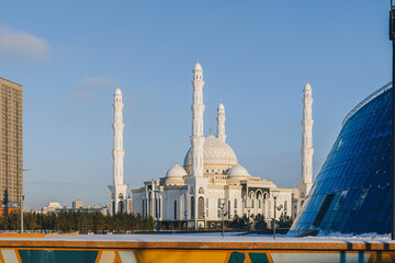 Panoramic view of snow-white modern Hazaret Sultan mosque sunny morning, Nur-Sultan, Astana, Kazakhstan. . High quality photo