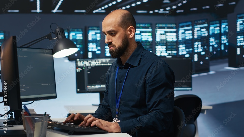 Poster engineer coding, working in network security data center facility hosting supercomputers, ensuring o