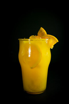 trago naranja, vaso, citricos