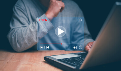 Video streaming on internet concept, Businessman watching live multimedia video content streaming...