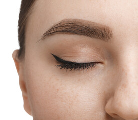 Makeup product. Woman with black eyeliner and beautiful eyebrow on white background, closeup